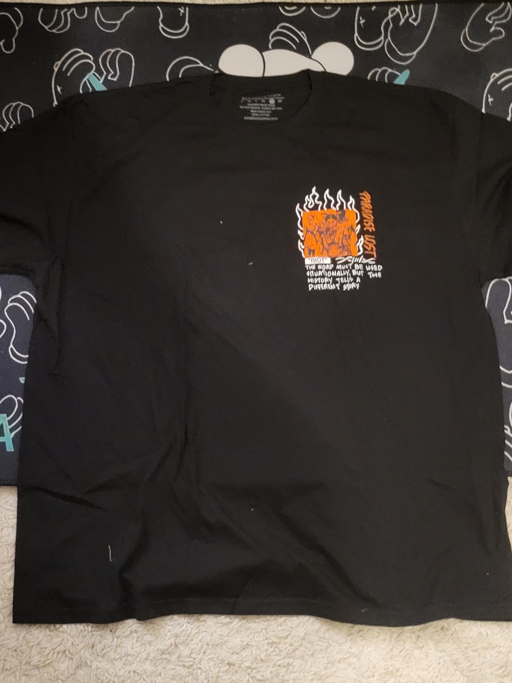 Men's Black Short-Sleeve Graphic Tee with Orange Flame Pocket Art